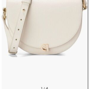Brand new Cole Haan Evie leather saddle bag ivory